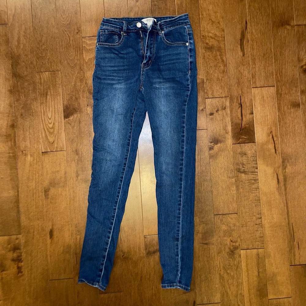 24 Forever21 skinny blue jeans